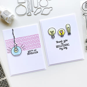 Two cards with light bulbs and patterns
