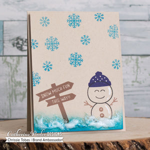 Snowman with wooden sign and blue snowflakes on brown cardstock