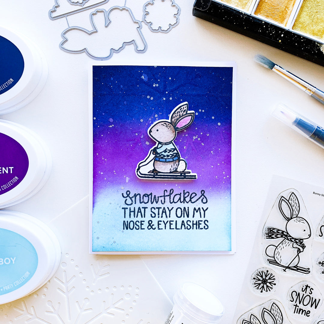 Skiing Bunny over blended starry splatter background