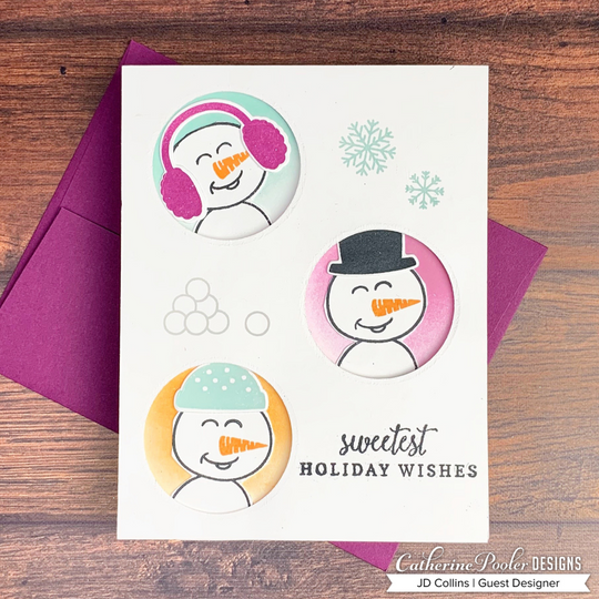 Snowmen in cutout windows with Holiday wishes sentiment