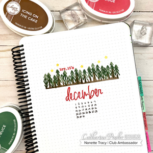 December Canvo Spread with green pine trees and calendar