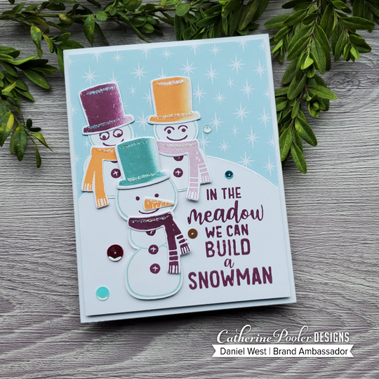 Three snowmen in hot tub, orange peel, and sangria on blue and white star background