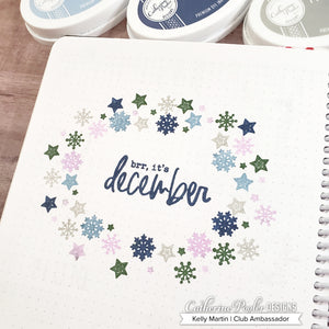 December Canvo spread with snowflake wreath in blue and green