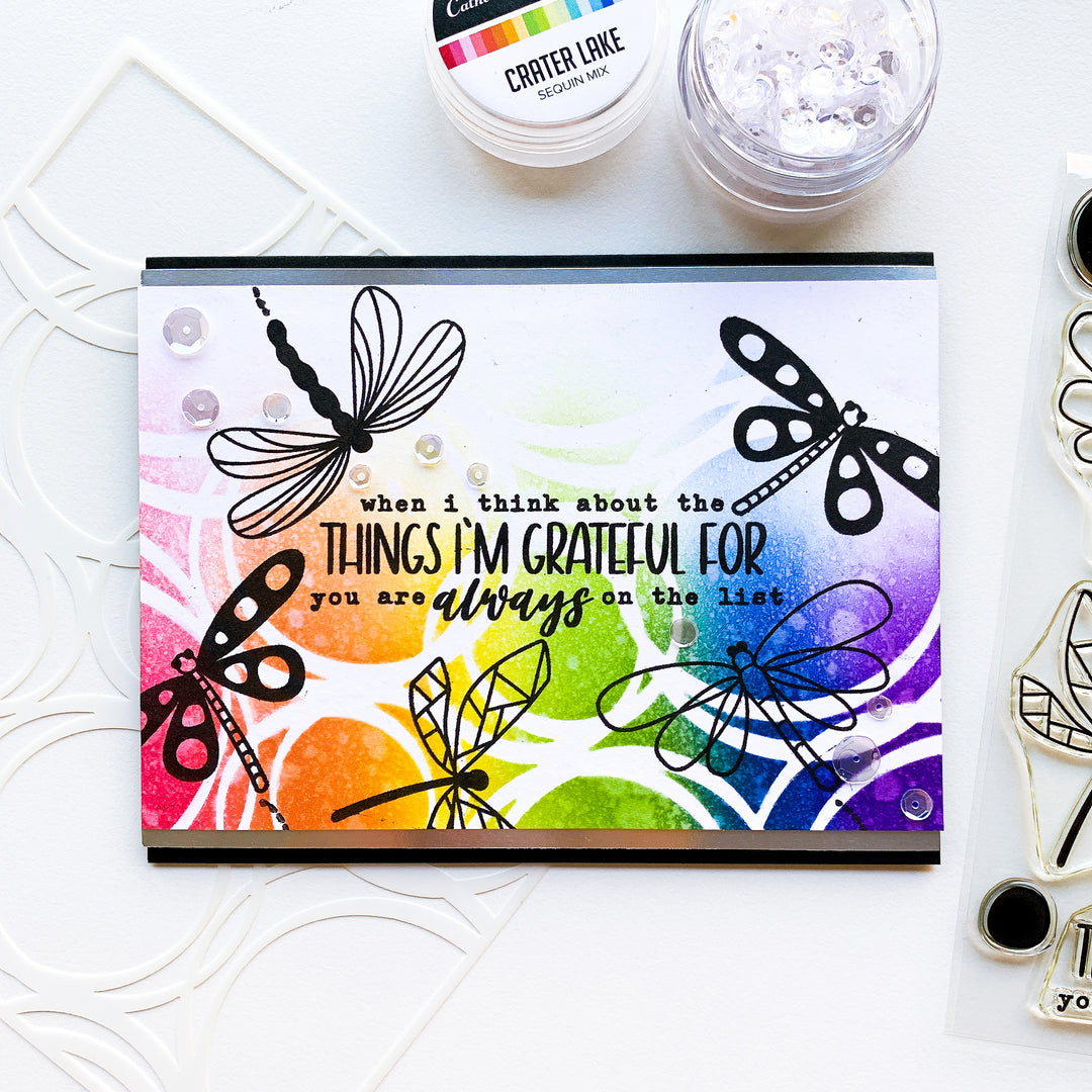 colorful scribbled circles card with dragonflies