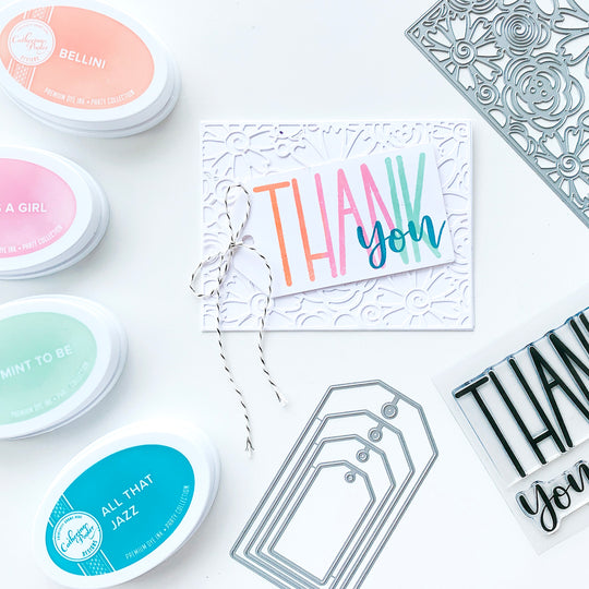 Big Thanks Stamp Set Tag on white flower background