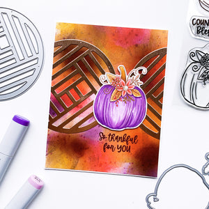 Purple pumpkin on splatter background card