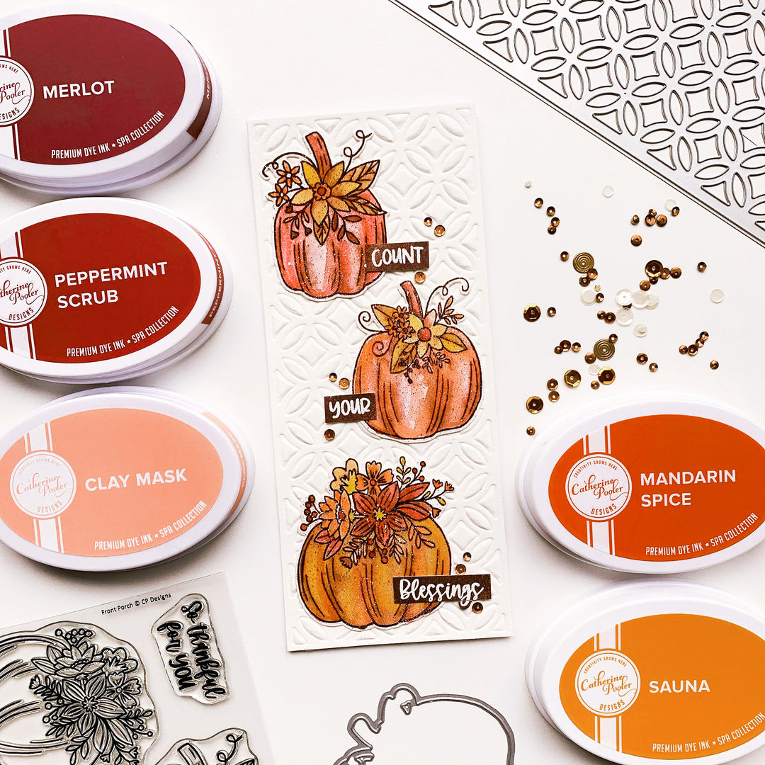 Three orange pumpkins over sitting pretty slimline card