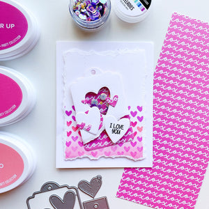Heart shaker tag over heart patterned paper
