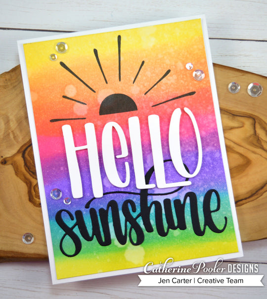 hello sunshine with rainbow background