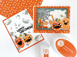 two halloween cards next to mandarin spice ink pad