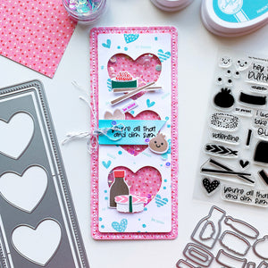 Heart Trio shaker card over pink patterned paper and Hey There Dumpling sushi add-ons.