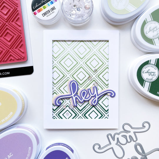 Hey card using Hey word dies, Simply Diamonds background stamp, Crater Lake sequins, Matcha, Sage. Spruce, Whipped Honey, Lilac and Crushed Violet ink pads.