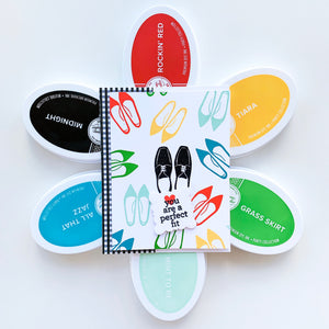 card with shoes and sentiment on top of ink pads