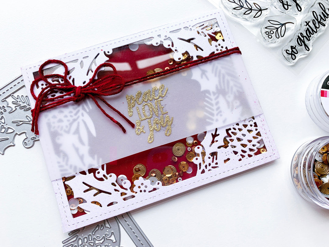 Holly Framed Cover Plate Die Shaker Card over Cranberry Fizz background and Oak City Sequins