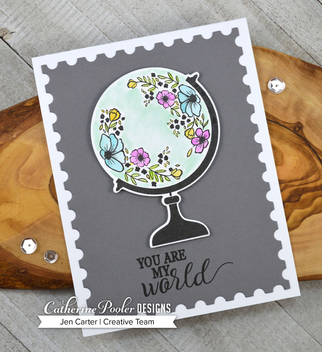 Amber's World Globe and Sentiment on Grey Background