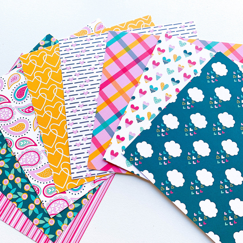 Lotsa Love Patterned Paper fanned out