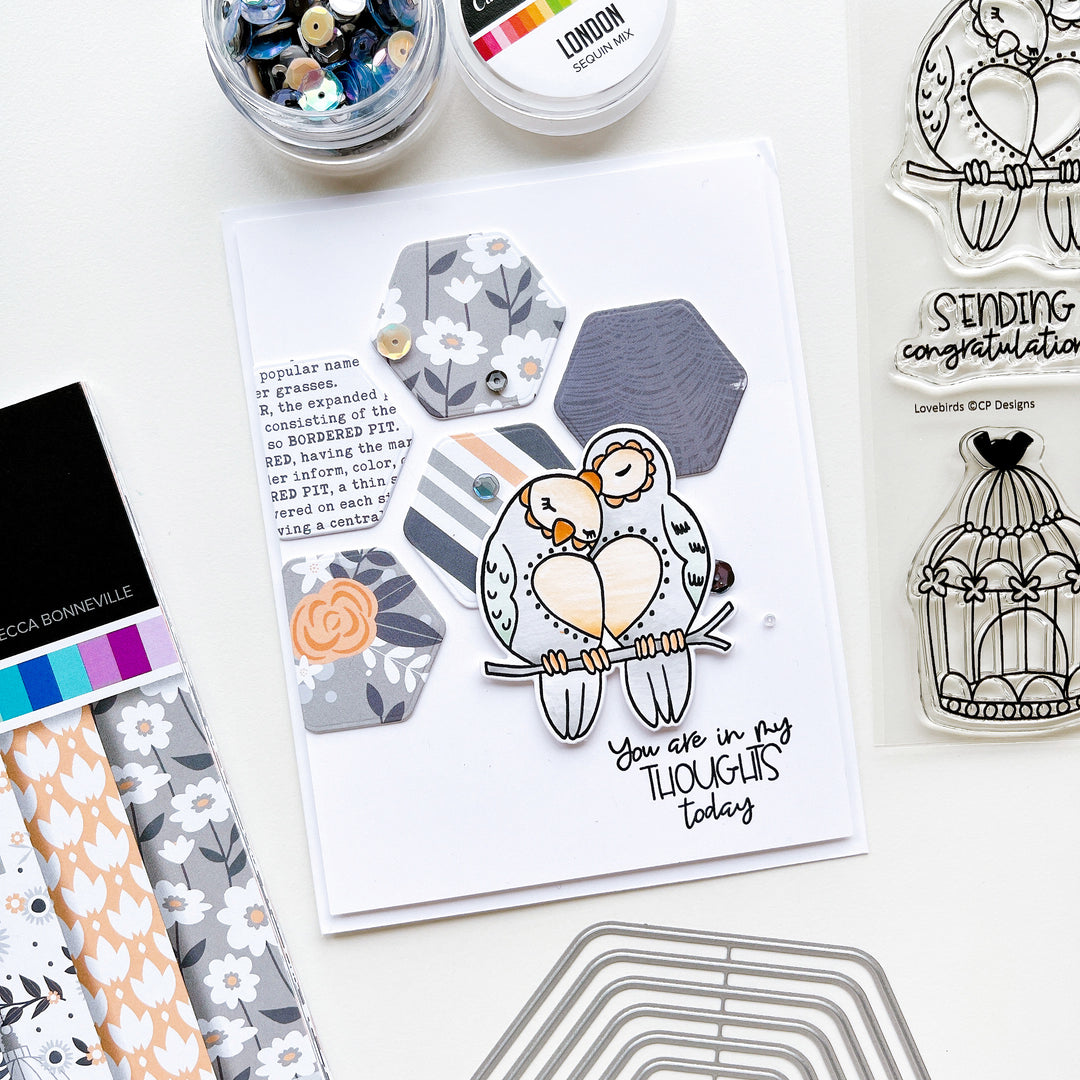 In my thoughts card using Lovebirds stamp set and dies, Twilight Reading patterned paper, Nested Hexagons dies, Midnight ink pad and London sequin mix.