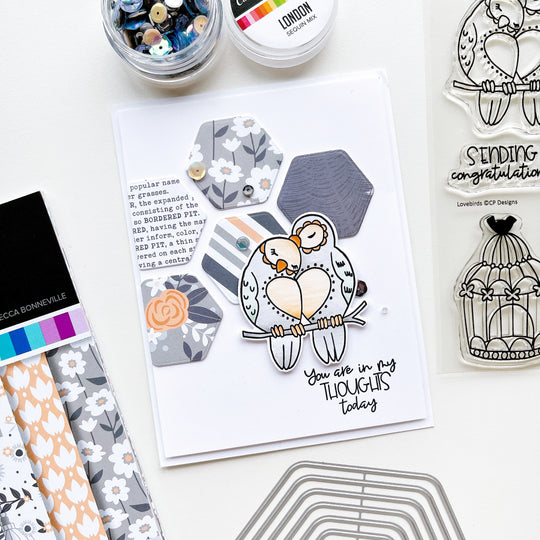 In my thoughts card using Lovebirds stamp set and dies, Twilight Reading patterned paper, Nested Hexagons dies, Midnight ink pad and London sequin mix.