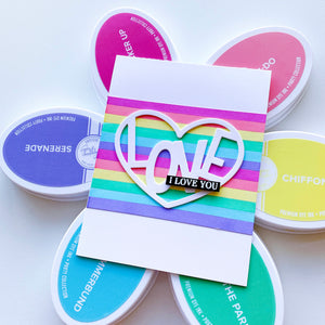 Love in Heart cut out over rainbow strips
