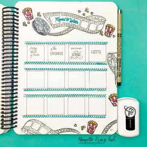 Movies to watch bullet journal spread with film roll