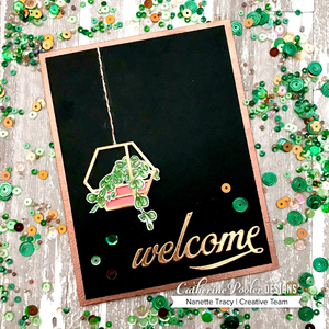 welcome card with plant stamp and sequins