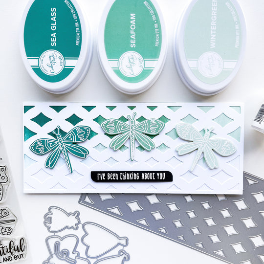 Thinking about you card using Marquise Slimline cover plate die, Night in Flight stamps and dies, Notes of Love Sentiments stamps and dies, Sea Glass, Seafoam and Wintergreen ink pads.