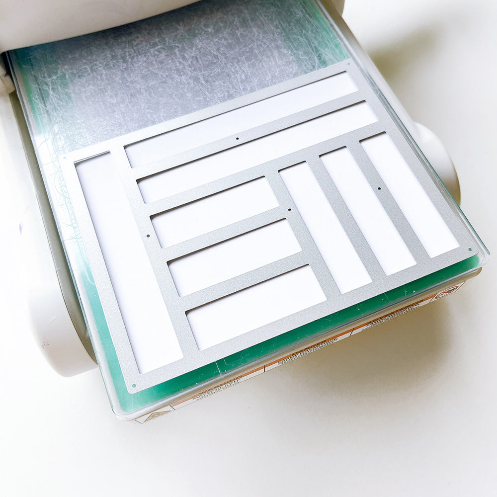 Parqs & Rec Cover Plate die in a Big Shot machine.