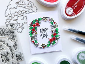 Peace Love and Holly garland ring on white card
