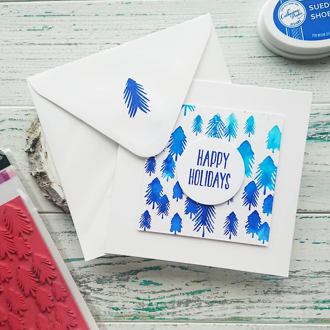 happy holidays card with one fine pine background