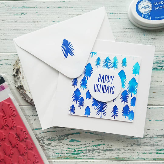 happy holidays card with one fine pine background
