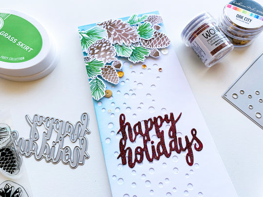 Pinecones layered over Flurries Slimline Background with Happy Holidays Senteiment
