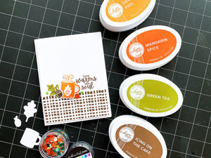 card with pumpkin season stamps next to coordinating ink pad