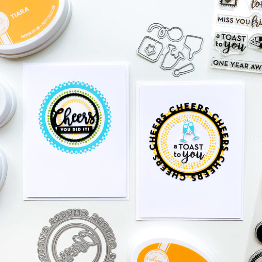 two cards made with round of cheers die