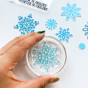 scrolling snowflakes stamp on clear block