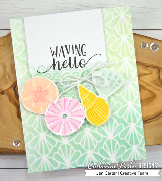 waving hello card with seashells