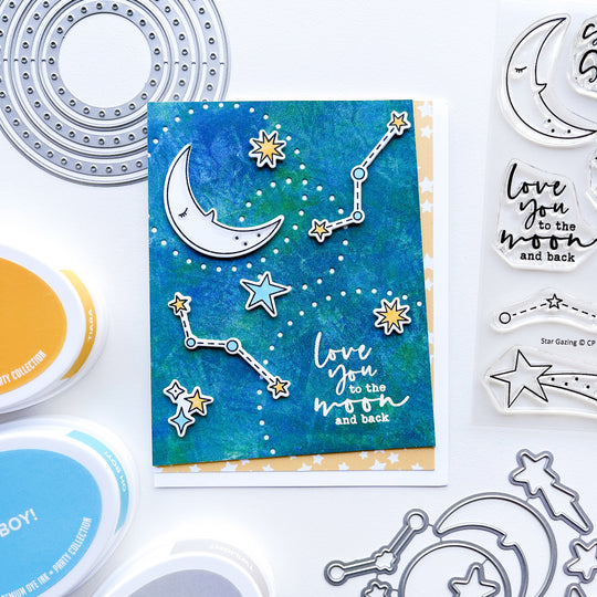 Love you card using Under the Stars patterned paper, Star Gazing stamps & dies, Round About dies, Tiara and Oh Boy! Ink pads, and white embossing powder.