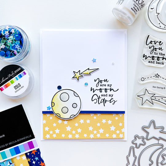 Moon and stars card using Star Gazing stamps & dies, Under the Stars patterned paper, Midnight ink pad and Oslo sequin mix.
