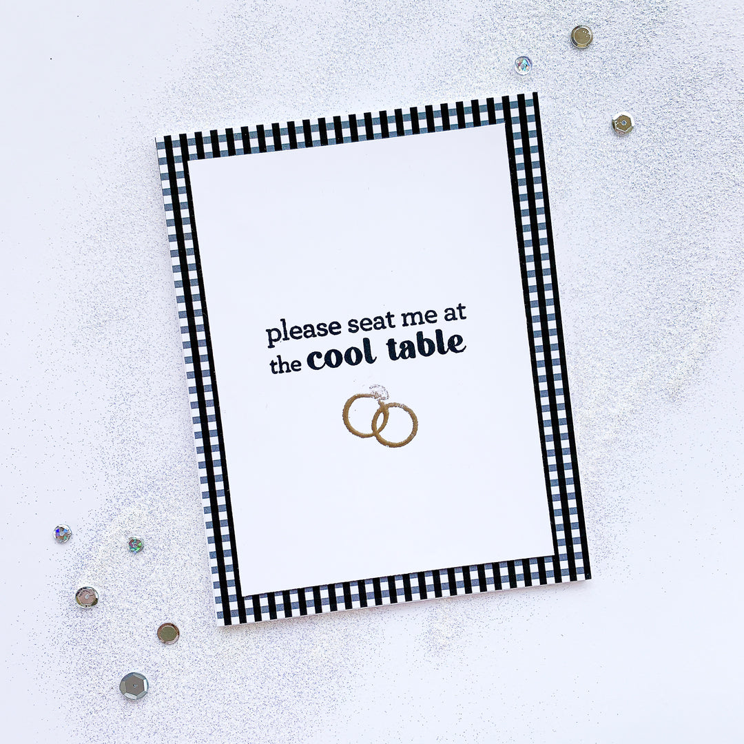 card with sentiment and wedding rings
