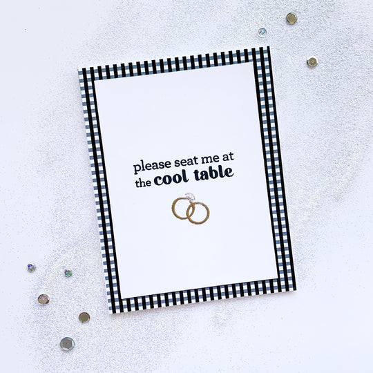 card with sentiment and wedding rings